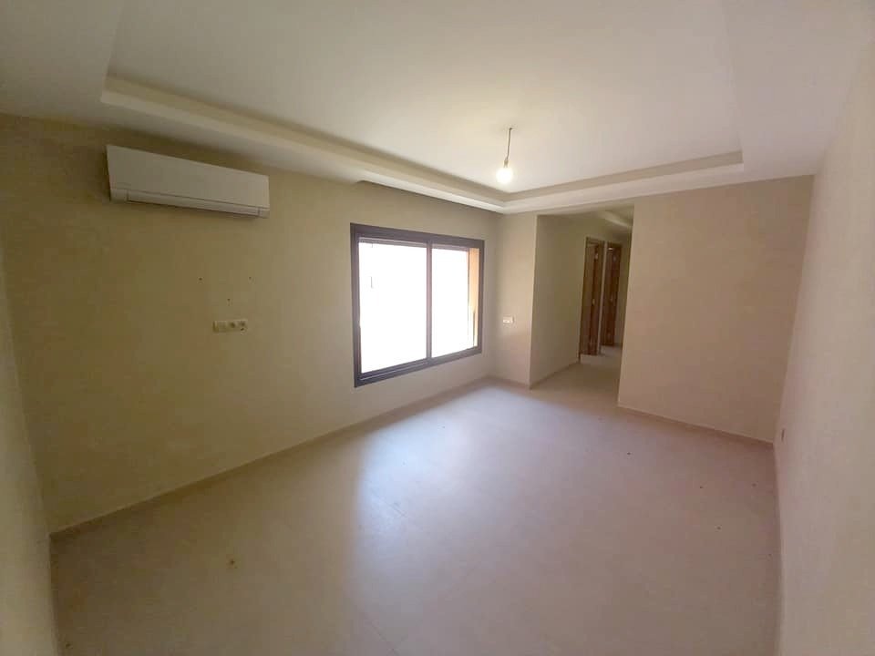 Appartement de 2 chambres à louer vide dans une résidence avec piscine collective sur la route de Casa - Marrakech