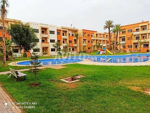A Louer un très bel appartement meublé de 2 ch salon situé dans d'une résidence de haut standing avec des grandes piscines à Targa Marakech