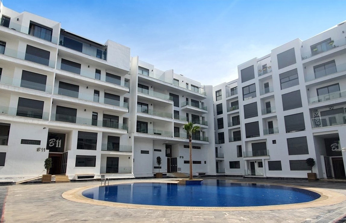 Bel appartement neuf à louer vide de 2ch avec balcon, résidence sécurisée avec piscine et salle de sport à Founty