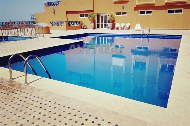 Coquet appartement F2 à louer meublé avec une superbe terrasse vue sur mer résidence avec piscine à Taghazout Bay