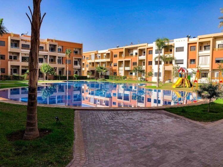 Bel appartement au rez de jardin à louer meublé 2ch avec terrasse, jardin privatif résidence sécurisée avec piscine à Targa