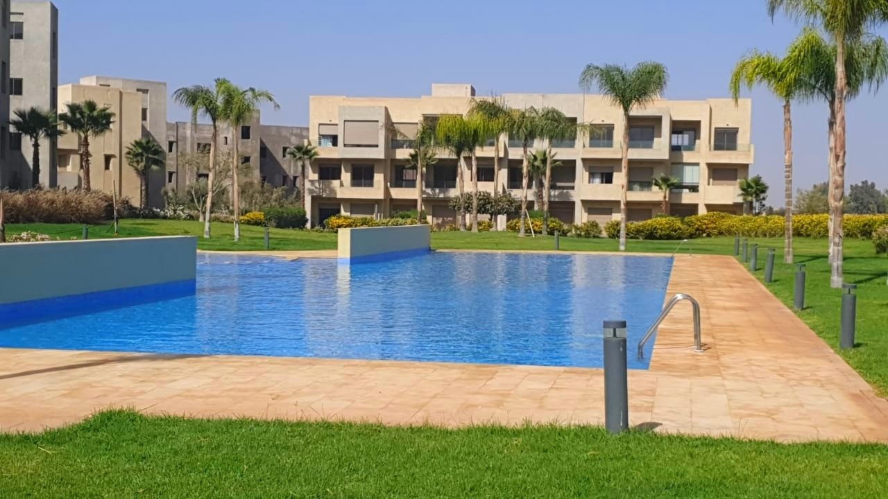Bel Appartement Lumineux tout neuf  à louer vide de 2 chambres avec une jolie terrasse dans une résidence avec piscine collective sur la route d'amzmiz - Marrakech