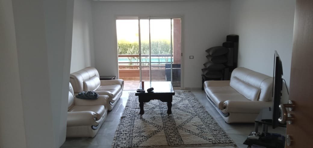 Bel appartement au rez de chaussé à louer meublé 2 ch avec terrasse, résidence sécurisée avec piscine et jardin à Agdal - Marrakech