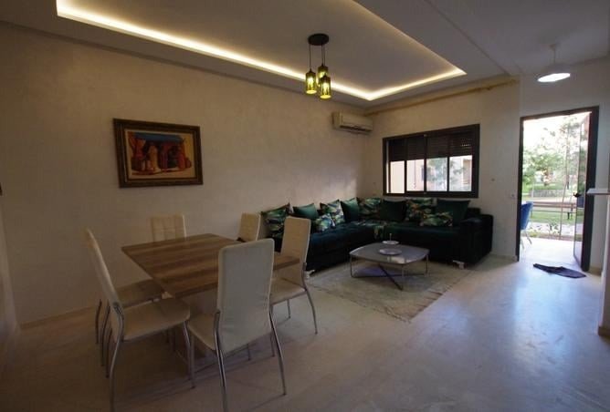 Appartement bien meublé de 2 chambres avec jardin privé dans une résidence avec piscine à Targa - Marrakech