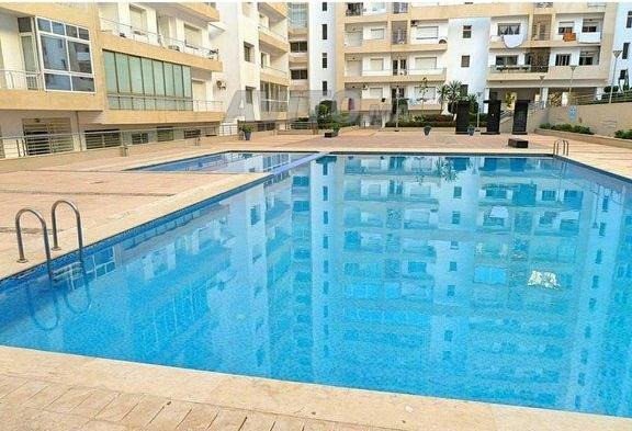 A vendre: Appartement en rez de chaussé F3 en bon état, résidence sécurisée avec piscine au quartier Hay Mohammadi